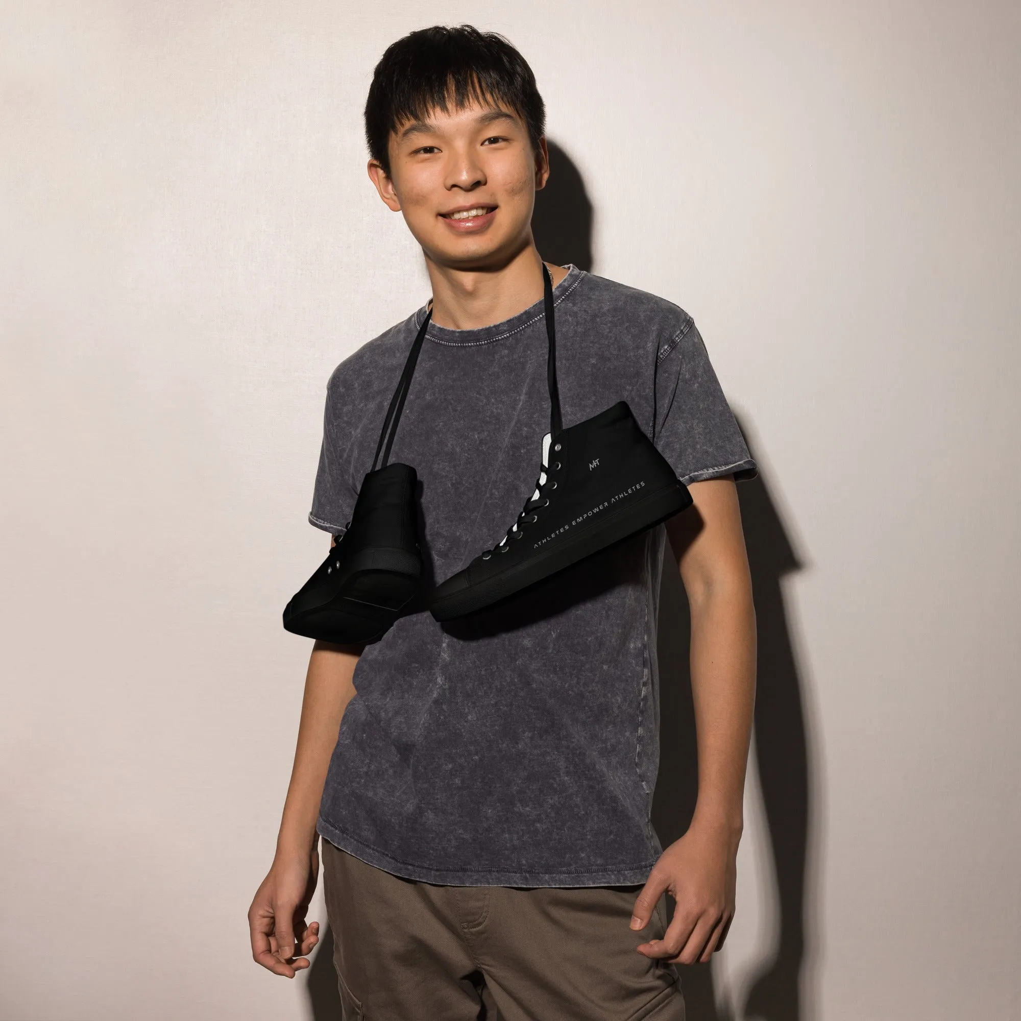 Athletes Empower Athletes - Men’s high top canvas shoes