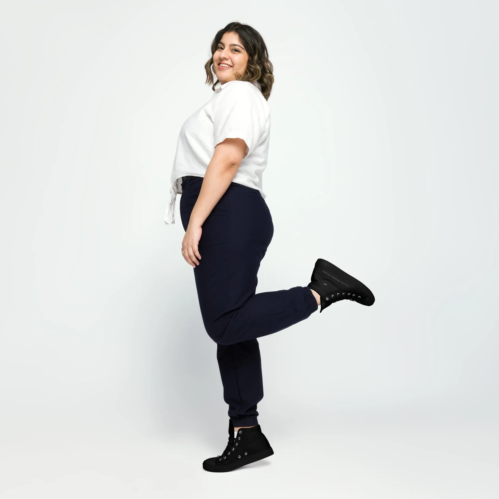 Athletes Empower Athletes - Women’s high top canvas shoes