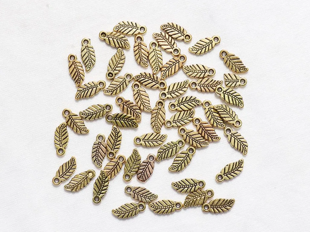 Golden Leaves Designer Plastic Beads - 8x18 mm