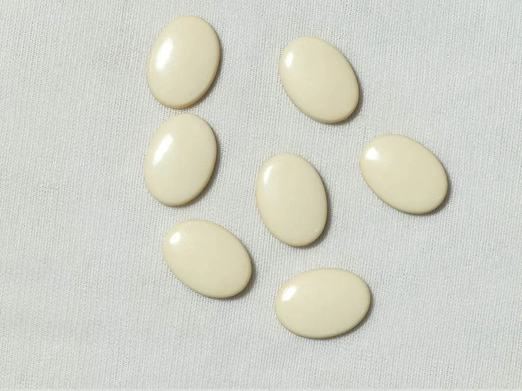 Off White Oval Plastic Beads - 14x10 mm